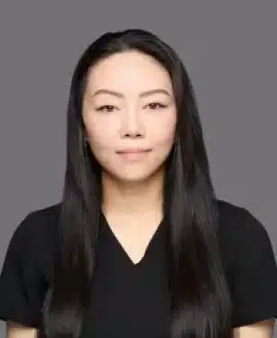 Shelly the registered dental assistant at Aurora Dental Group smiling in a professional headshot