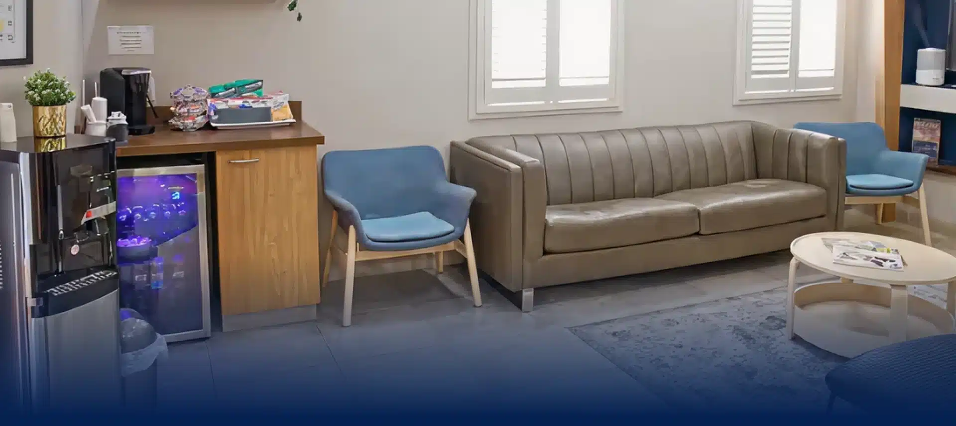 Comfortable waiting room interior at Aurora Dental Group in Lacombe AB with seating and natural light