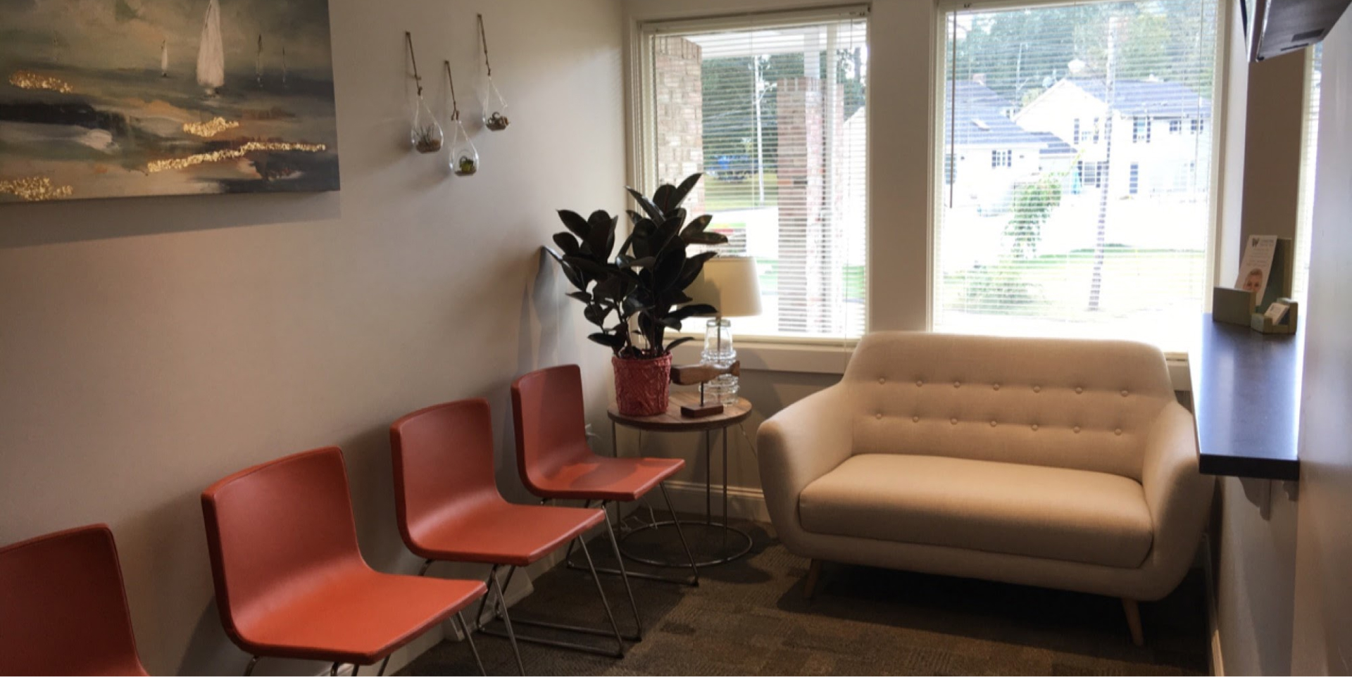 Reception area seating arrangement for patients at Coastal Dental Arts in Peabody, MA