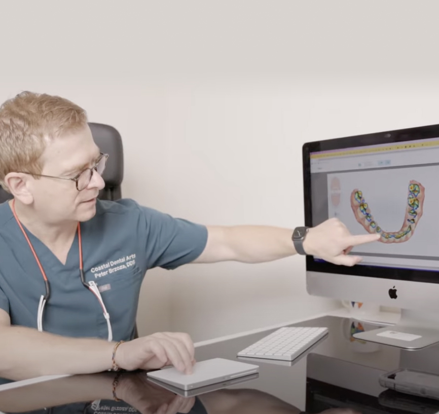 Dentist showing Dental implants 3D image