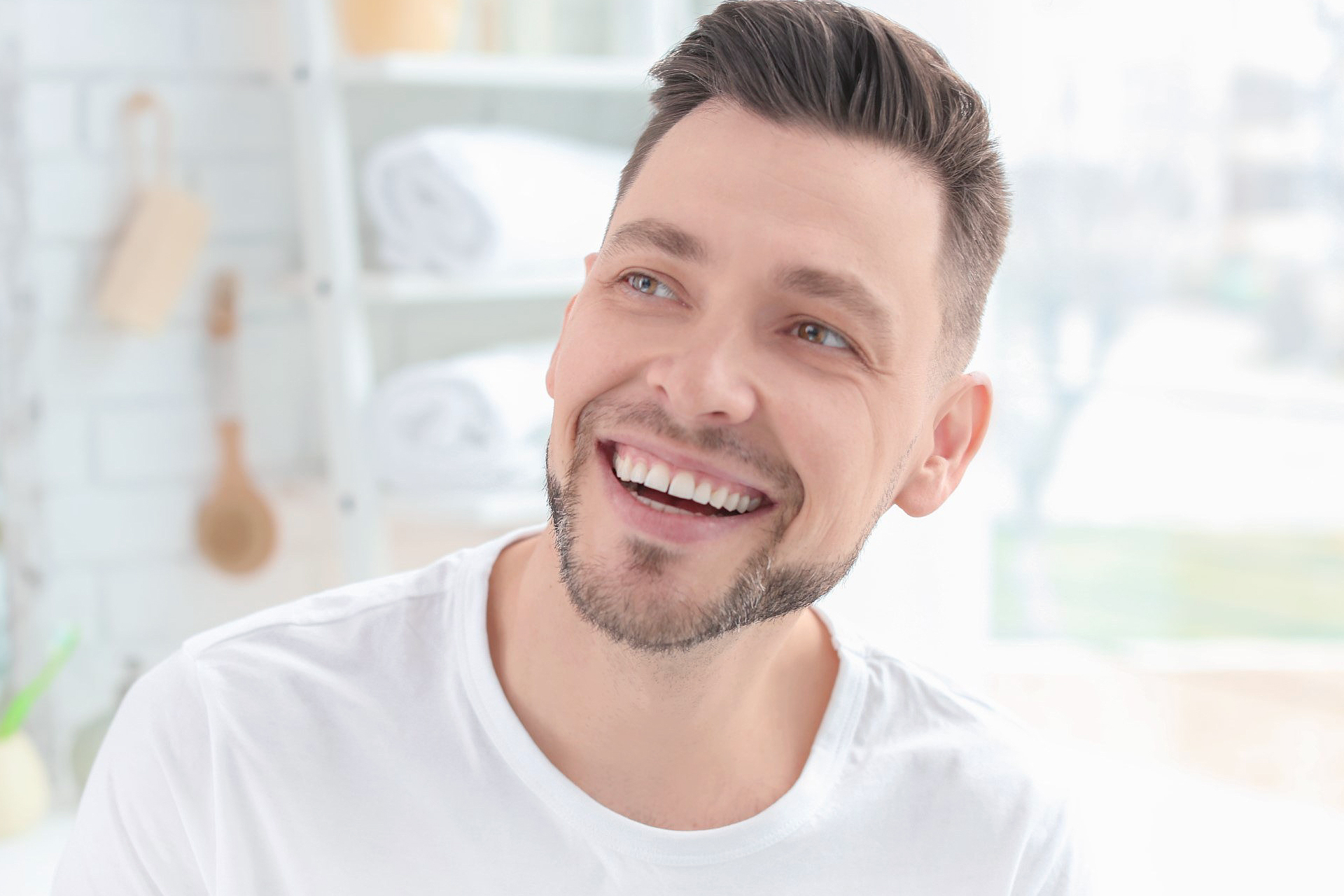 Gentleman smiling after gum disease treatment at Coastal Dental Arts in Peabody, MA