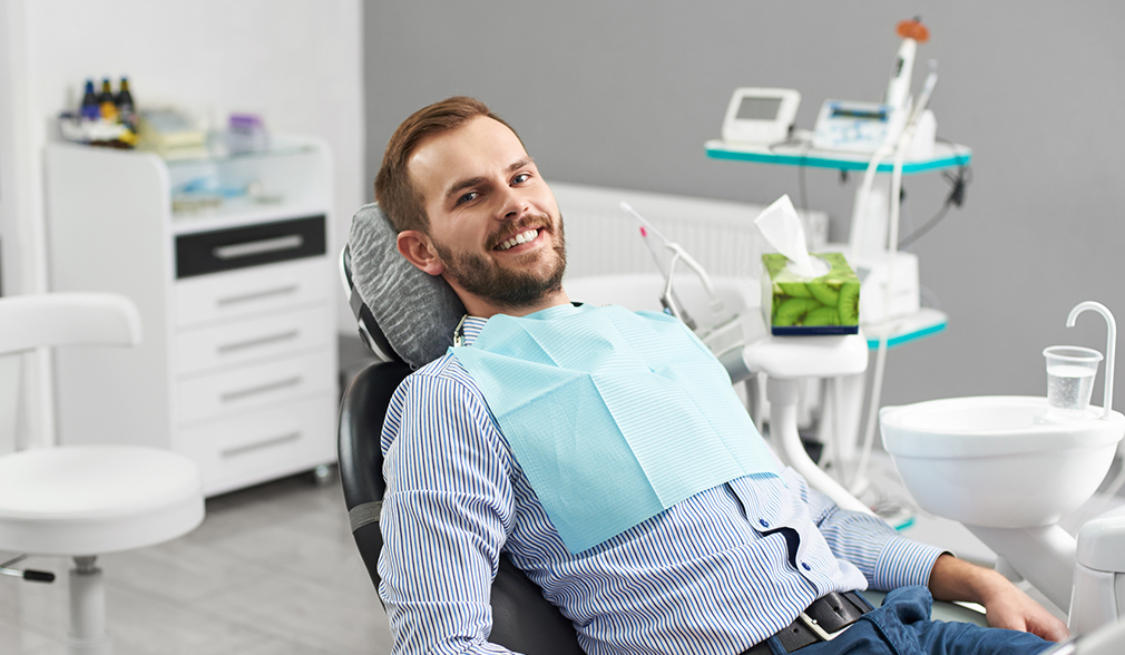 Gentleman lying in a dental chair during a preventive dental care visit at Coastal Dental Arts in Peabody, MA