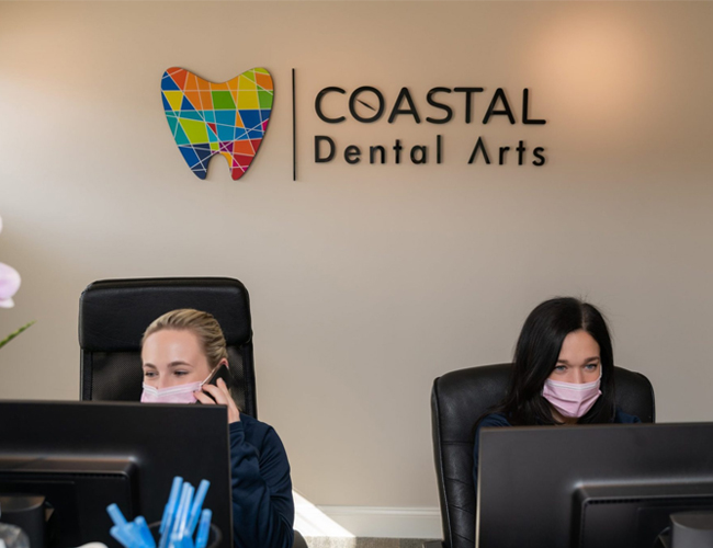 Women receptionists working at Coastal Dental Arts in Peabody, MA