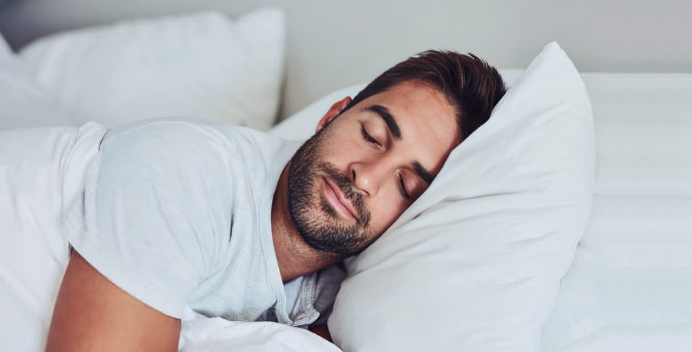 Gentleman sleeping peacefully after sleep apnea treatment in Peabody, MA