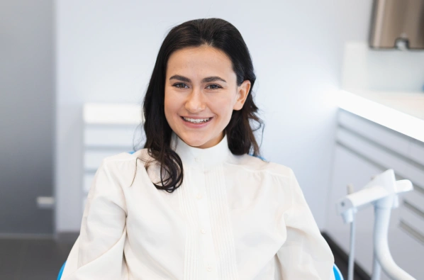 Smiling patient promoting preventive dental care and professional teeth cleaning
