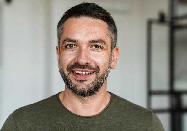 Smiling man with a healthy smile after dental restorations