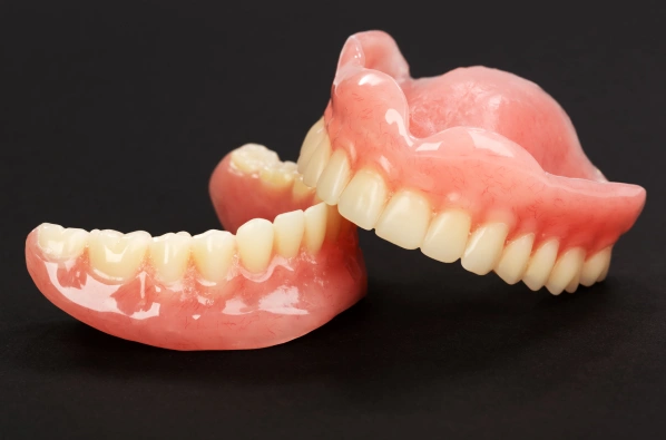 Full set of dentures designed to restore function and appearance