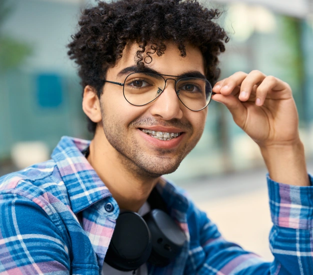 Portrait of a smiling patient wearing glasses