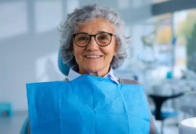 a older women ready to take tooth cleaning