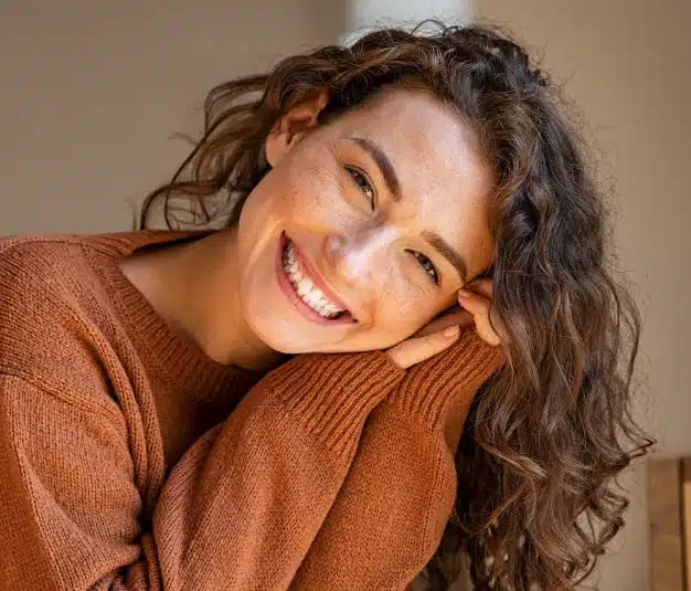 a beautiful girl smiling after received teeth whitening treatment in Culver City