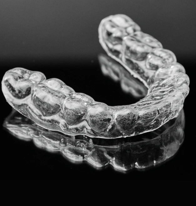 Custom dental night guard for bruxism treatment at The Dentist Place of Clearwater in Clearwater, FL