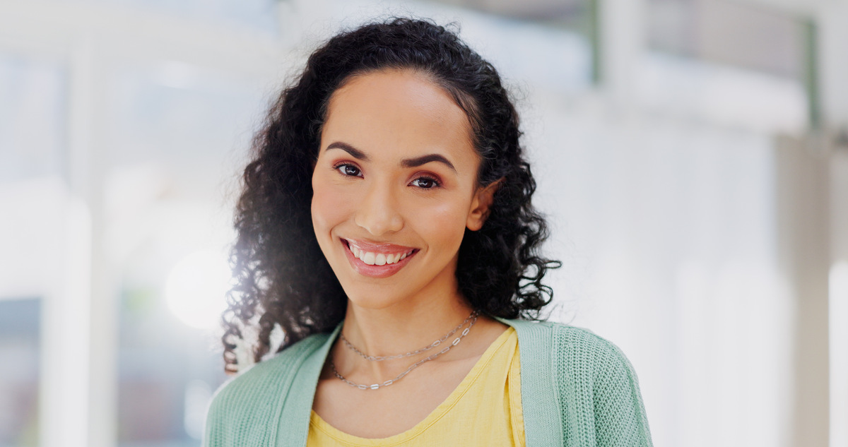 Confident woman showing stain-free white smile