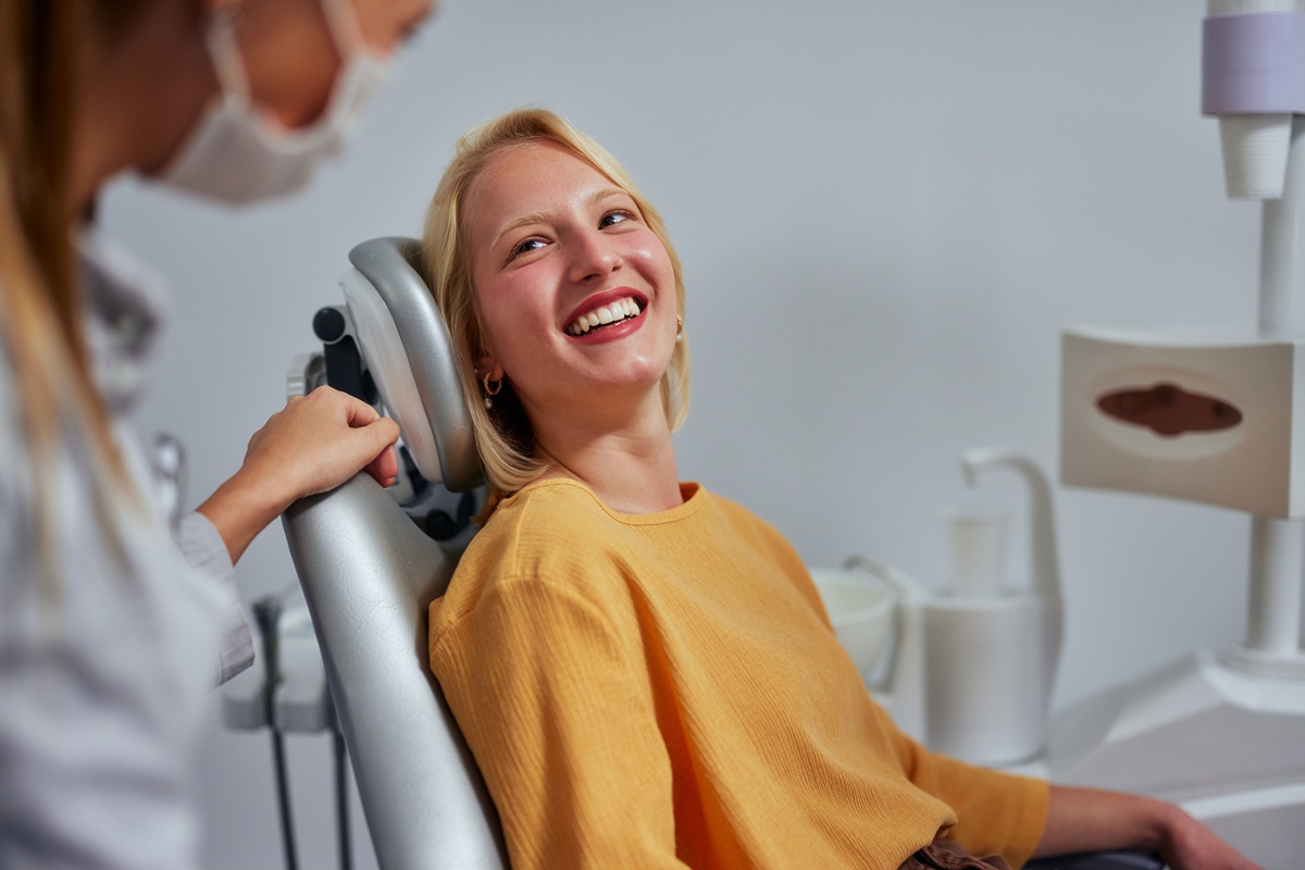 placing a dental crown to restore a broken tooth