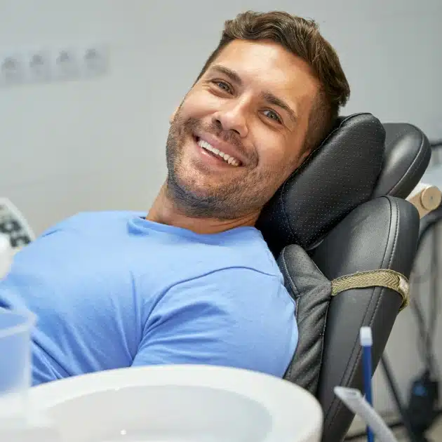 New dental patient relaxing during their first visit, highlighting welcoming dental experience