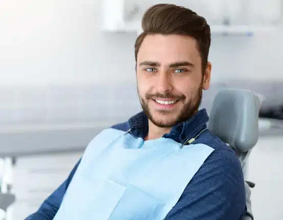 Relaxed dental patient in a chair representing a comfortable sedation dentistry experience in Harper Woods MI