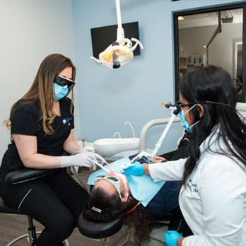 Nashua Dentist Dr. Bhat Treating Patient