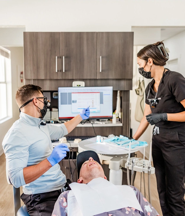 Dr. Joshua Ferraro, Horizon Dental Designs, Dentist Plant City, FL, working on a patient-3
