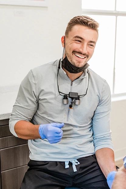 Dr. Joshua Ferraro, Horizon Dental Designs, Dentist Plant City, FL, working on a patient