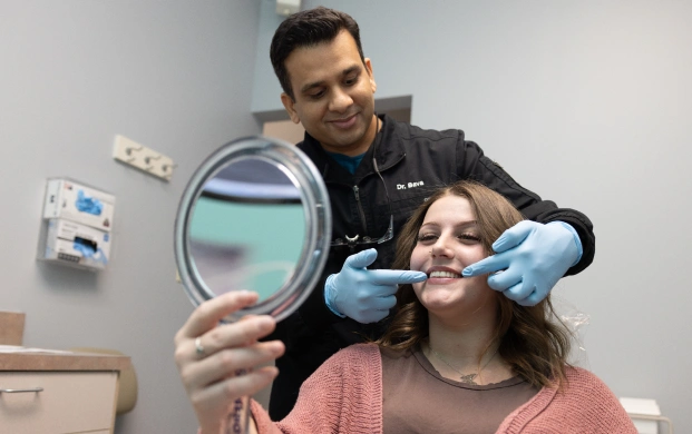 Severe tooth pain patient seeking emergency dentist in Raleigh