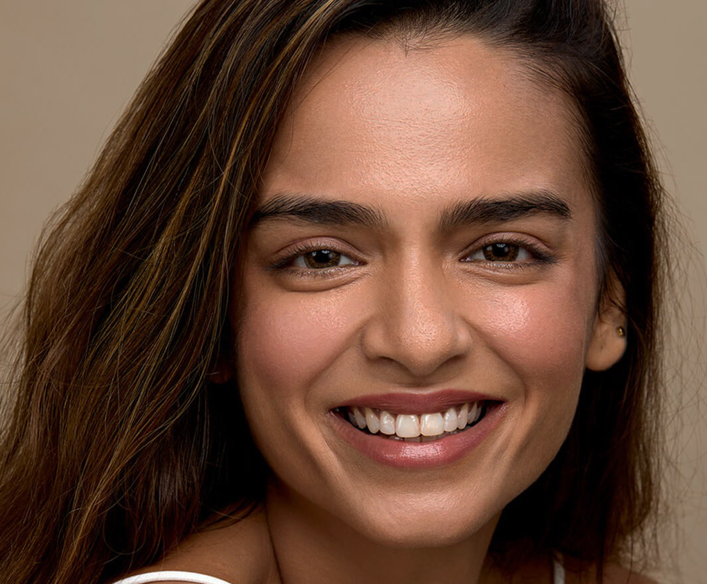A lady patient after cosmetic dental tratments