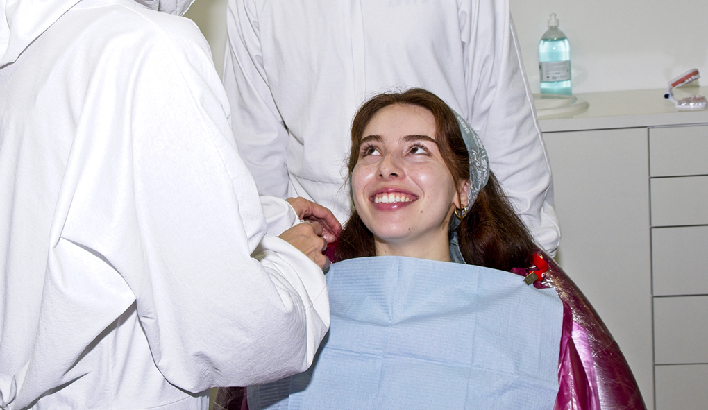 Patient with dentist Dr. David Donelson at Hallmark Dental just before treatment, being reassured for a stress-free experience.