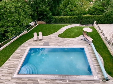 Compact backyard oasis with full-function design