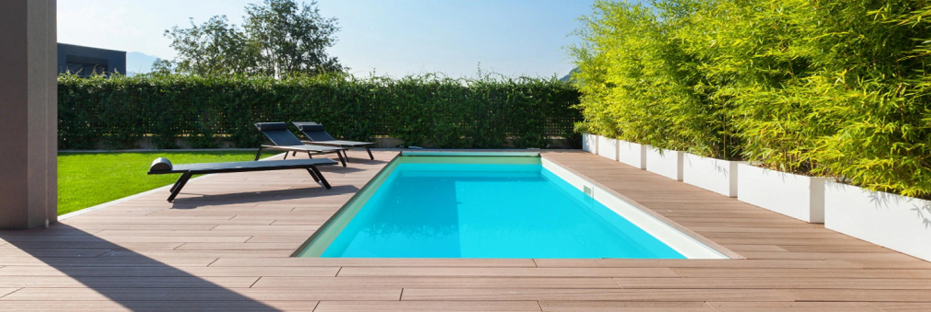 Custom gunite swimming pool and backyard retreat built by Imber Pool & Outdoor