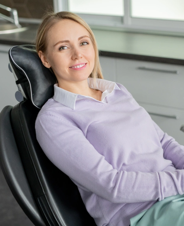A patient in Alpharetta smiling after receiving affordable dental care.