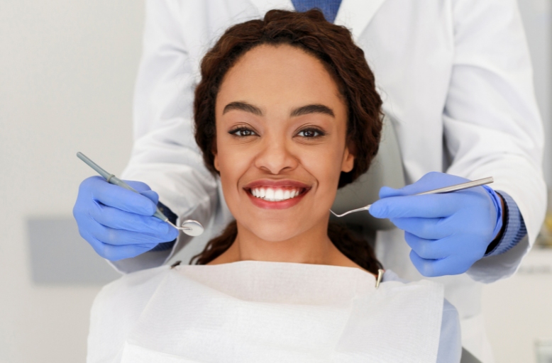 Smiling patient during cosmetic dentistry treatment in Alpharetta GA