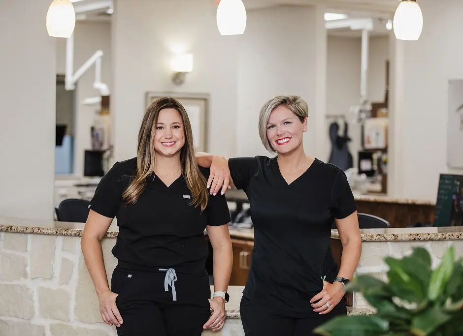 Friendly dental team members welcoming patients at Katy Smile Design