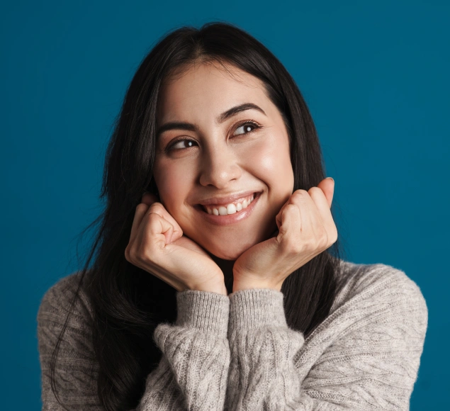 Cosmetic dentistry in Lilburn. Young woman smiling brightly after receiving cosmetic dental care at Lilburn Smile Makers Dental in Lilburn, Georgia