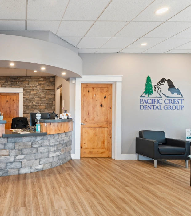 Pacific Crest Dental Group modern reception area with natural wood accents