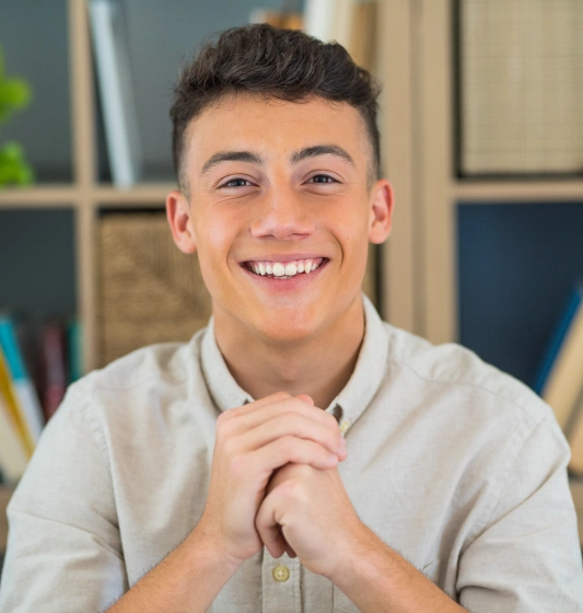Smiling gentleman after restorative dental treatment.