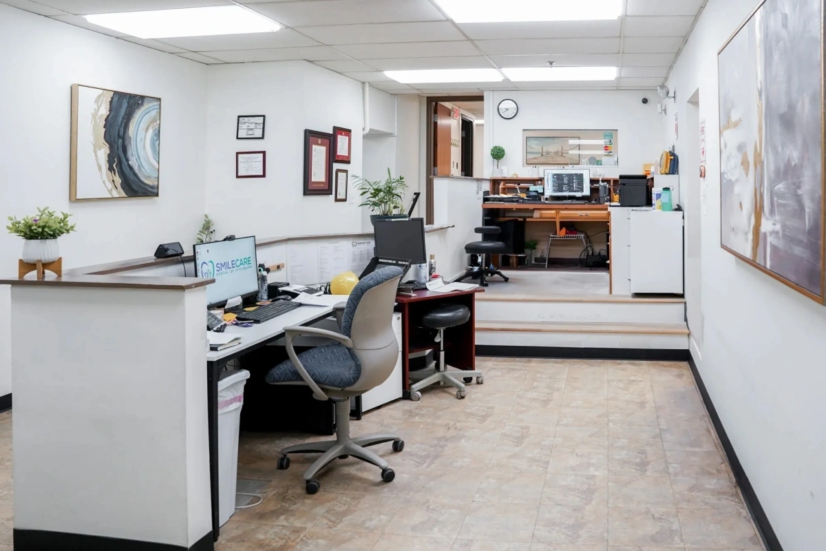 Open workspace and administrative area inside Rollstone Family Dental