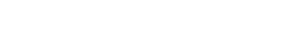Sunlit mountain peak with glowing light flare effect