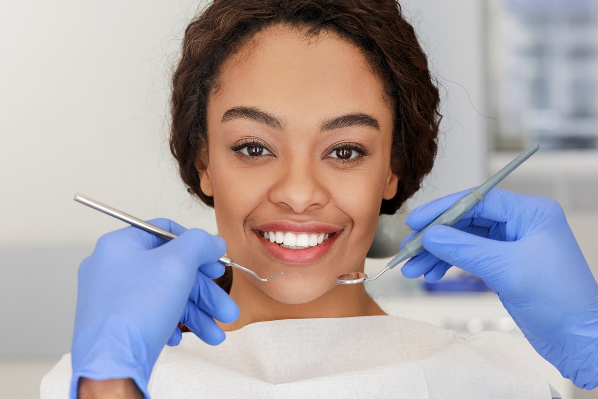 smiling patient after full mouth reconstruction