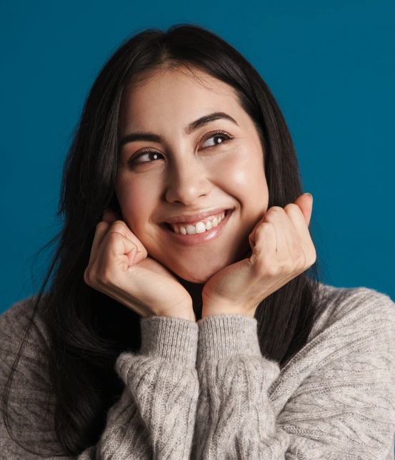 Woman smiling with healthy gums after professional gum disease treatment at South Arlington Smiles in Arlington, TX.
