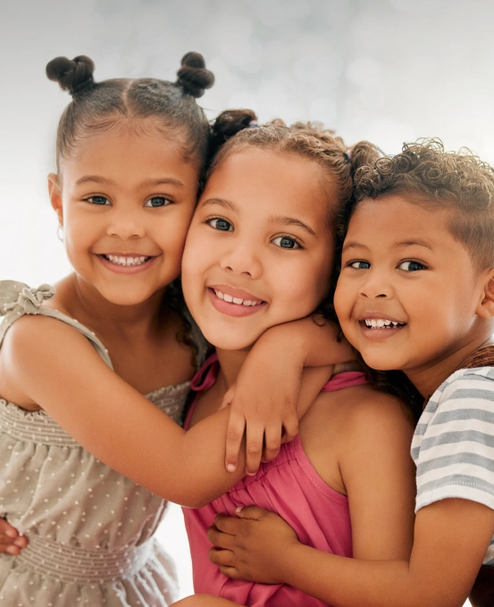 Smiling children enjoying gentle pediatric dental care at South Arlington Smiles in Arlington, TX.