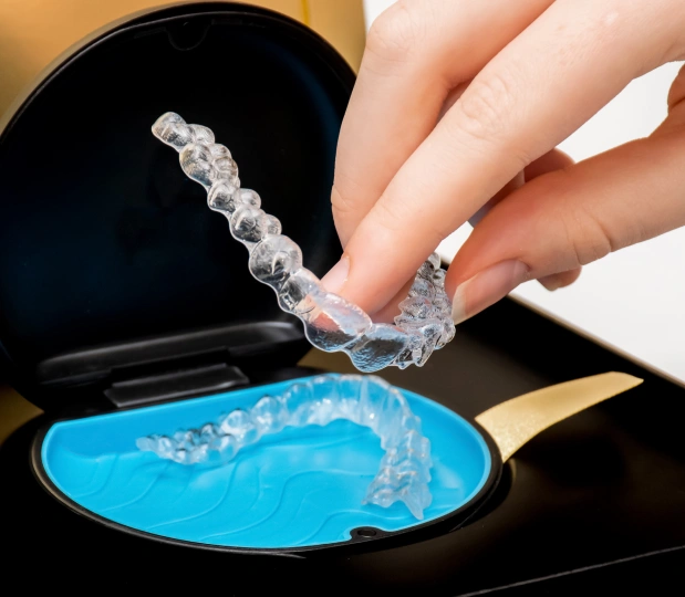 Cosmetic orthodontics with Invisalign at Stuyvesant Dental, Manhattan NYC dentist enhancing smiles discreetly.