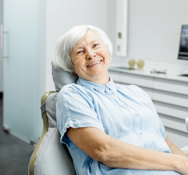 A relaxed patient after gentle root canal therapy at Stuyvesant Dental in Manhattan, NYC, ensuring a comfortable and stress-free experience.