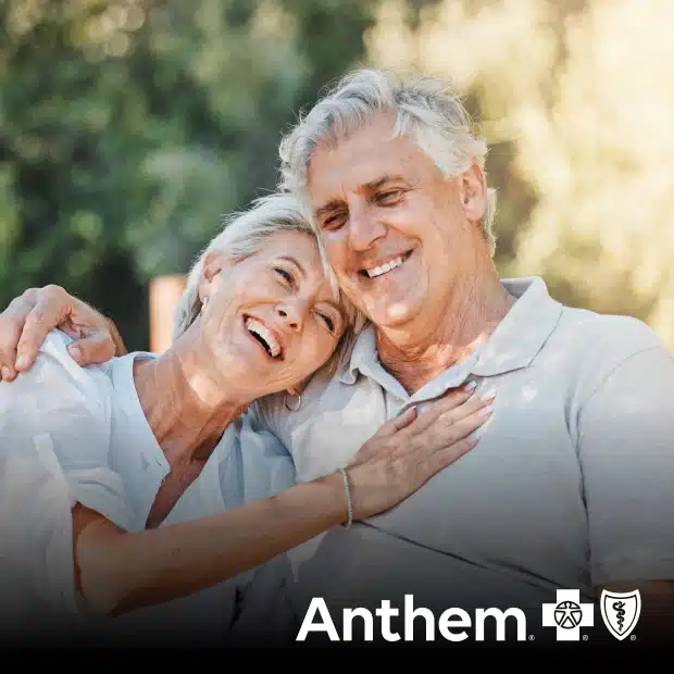 Happy couple smiling representing Anthem dental insurance accepted at Thrive Family Dentistry