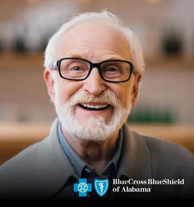 Elderly male patient smiling representing BlueCross BlueShield of Alabama dental coverage