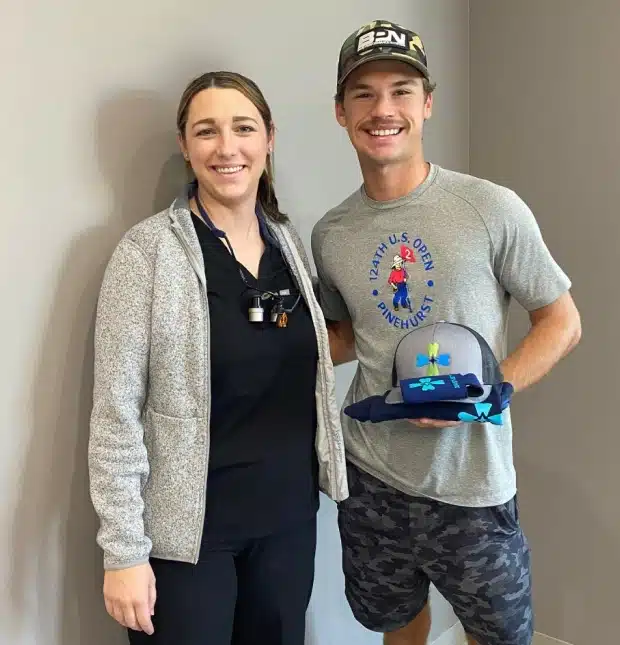 Dental team member with patient at Thrive Family Dentistry Auburn AL