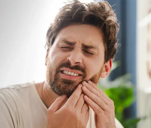 Man receiving TMJ disorder treatment at Thrive Family Dentistry of Auburn in Auburn, AL