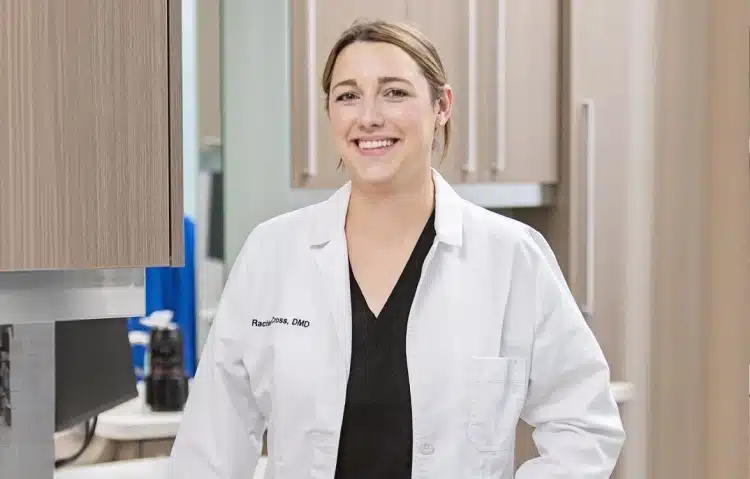 Dr. Rachael Cross, DMD, Auburn dentist, standing in a dental treatment room at Thrive Family Dentistry of Auburn