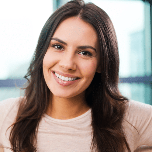 Woman with dental implants in Auburn