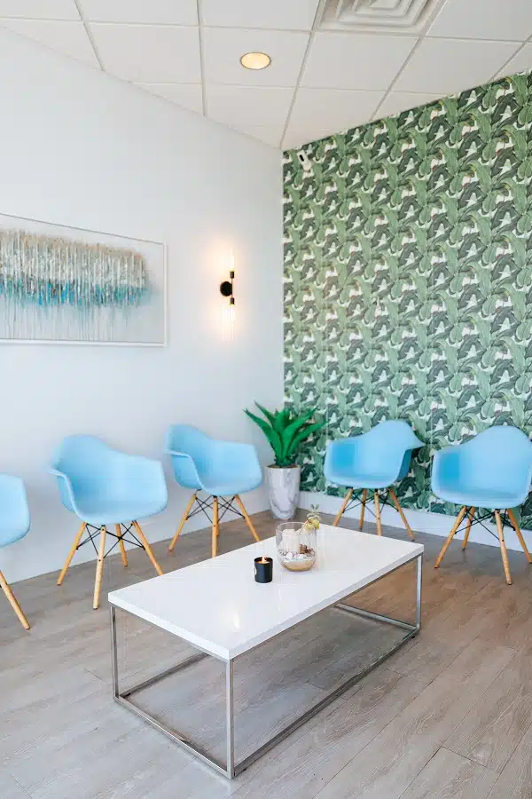 Comfortable patient waiting area with modern seating at TRU Dentistry SoCo in South Austin, TX