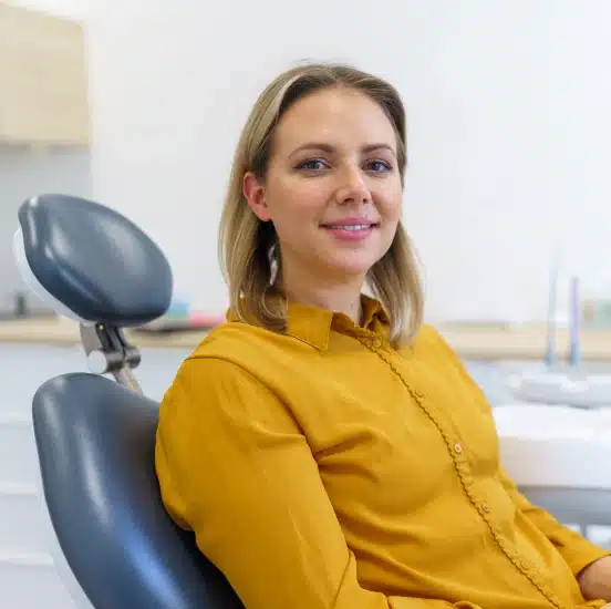 Woman relaxed in dental chair before her preventive cleaning and exam at TRU Dentistry SoCo in South Austin, TX