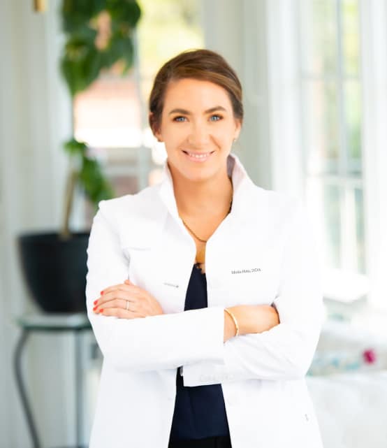 Charlotte dentist Dr. Minka Hotic standing in her dental office