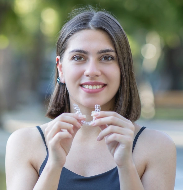 Patient showing results from clear aligner treatment in Kanata